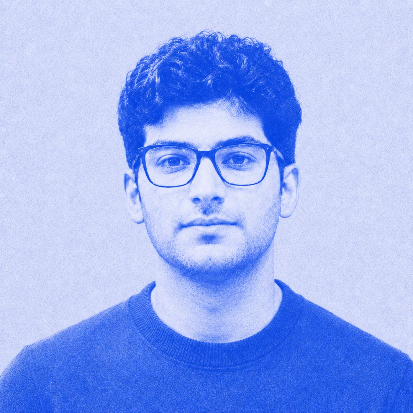Khalil Rehman, founder of Attoray, in a blue-toned portrait