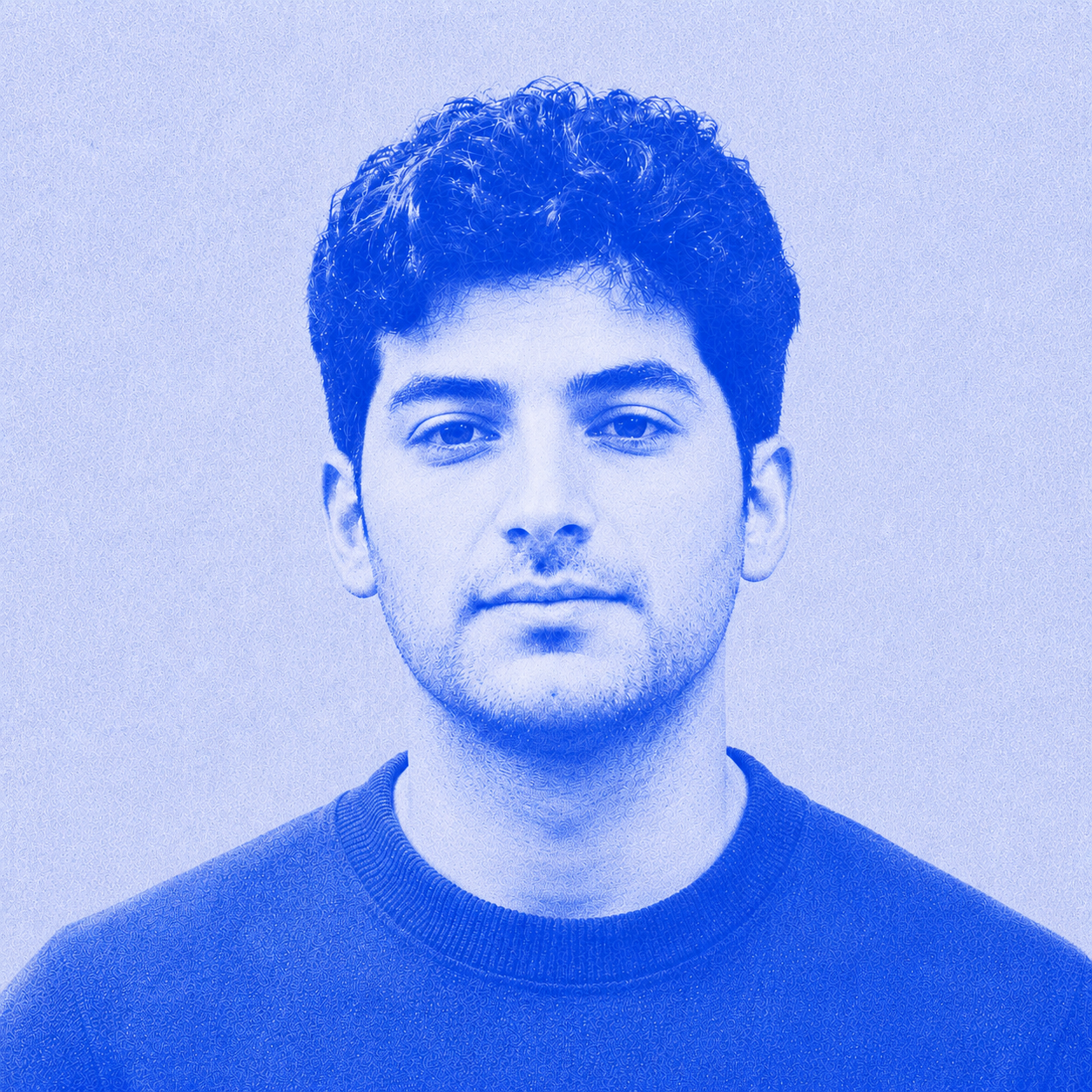 Khalil Rehman, founder of Attoray, in a blue-toned portrait